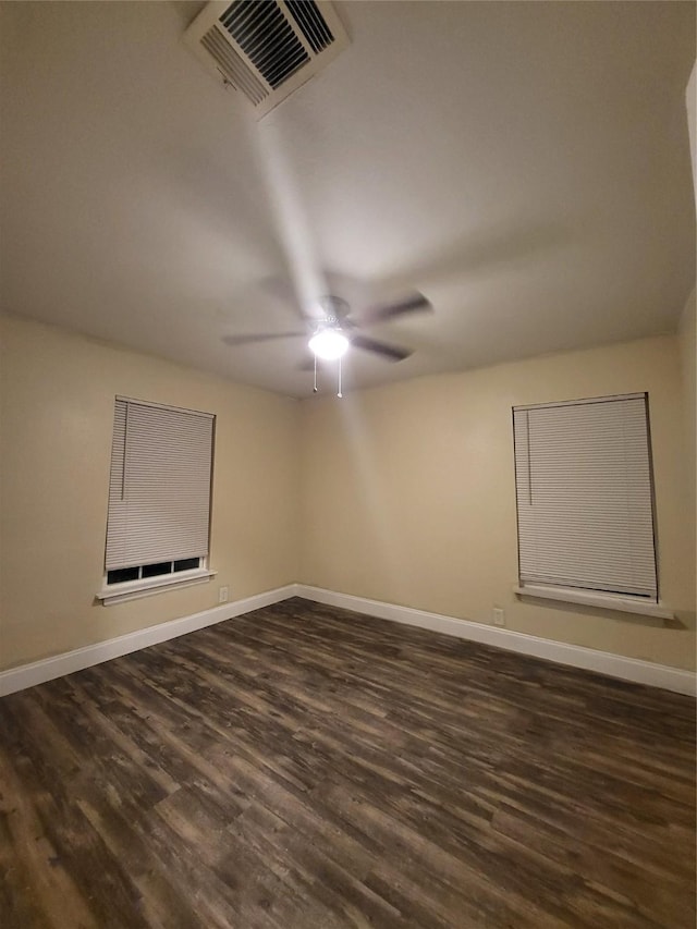 1906 N 4th St, Killeen, TX 76541 - empty room with dark wood-style flooring, baseboards, and a ceiling fan