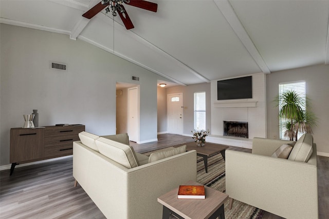 2513 Figtree Ln, Plano, TX 75074 - living area with a ceiling fan, baseboards, wood finished floors, and a brick fireplace