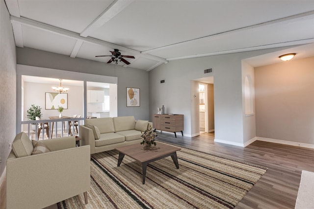 2513 Figtree Ln, Plano, TX 75074 - living area with wood finished floors, baseboards, a ceiling fan, and a chandelier