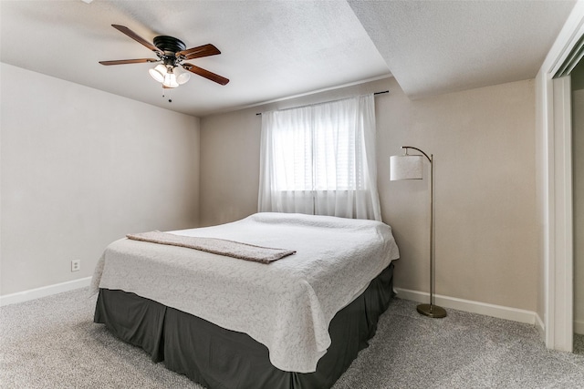 1017 Meadowbrook Dr, Grapevine, TX 76051 - carpeted bedroom with baseboards and a ceiling fan