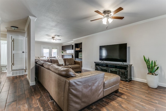 1017 Meadowbrook Dr, Grapevine, TX 76051 - living room featuring a ceiling fan, crown molding, dark wood-style flooring, and baseboards