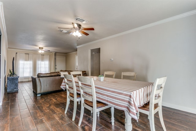 1017 Meadowbrook Dr, Grapevine, TX 76051 - dining room with ceiling fan, dark wood-type flooring, crown molding, and baseboards