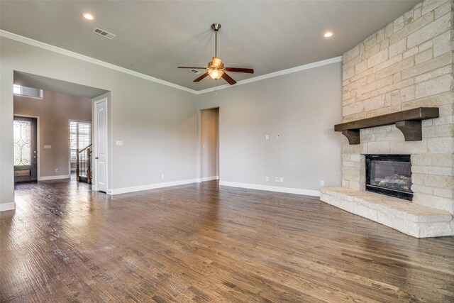 344 Redstone Dr, Sunnyvale, TX 75182 - unfurnished living room featuring ornamental molding, a ceiling fan, a fireplace, wood finished floors, and baseboards