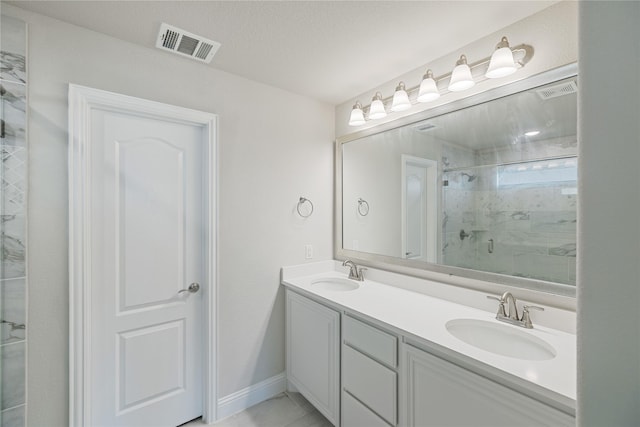 1008 Superbloom Ave, Justin, TX 76247 - full bath with a tile shower, double vanity, and baseboards