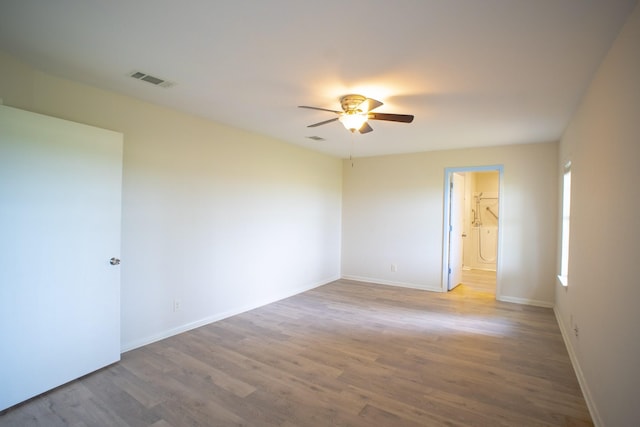 812 Crestline Dr, Mexia, TX 76667 - spare room featuring a ceiling fan, wood finished floors, and baseboards