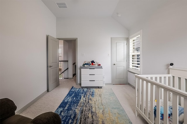 12959 Averi Ln, Farmers Branch, TX 75234 - bedroom with light carpet, vaulted ceiling, and baseboards
