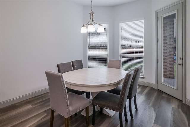 12959 Averi Ln, Farmers Branch, TX 75234 - dining area with baseboards and dark wood finished floors