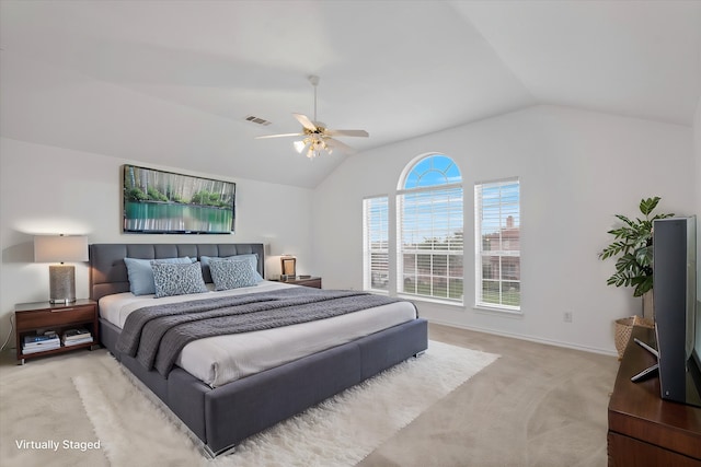 5919 Wisdom Creek Dr, Dallas, TX 75249 - bedroom with vaulted ceiling, light carpet, baseboards, and a ceiling fan