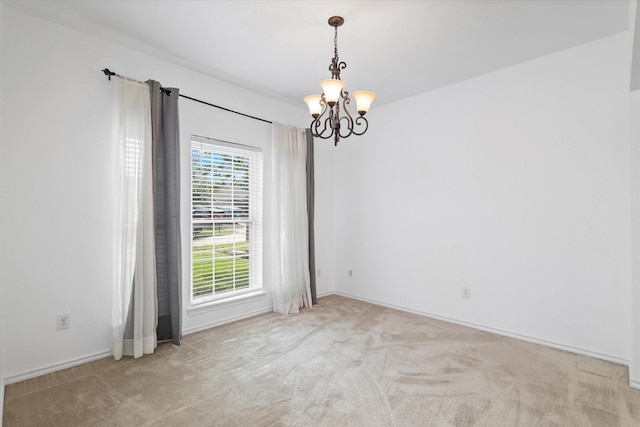 5919 Wisdom Creek Dr, Dallas, TX 75249 - carpeted empty room featuring a chandelier and baseboards