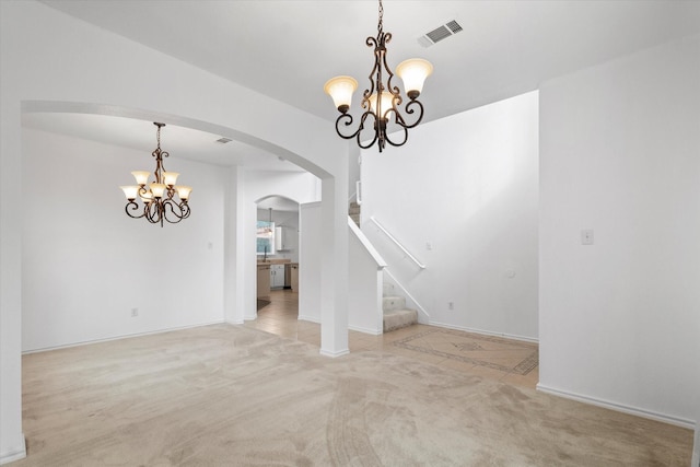 5919 Wisdom Creek Dr, Dallas, TX 75249 - empty room with a chandelier, arched walkways, stairway, and light colored carpet