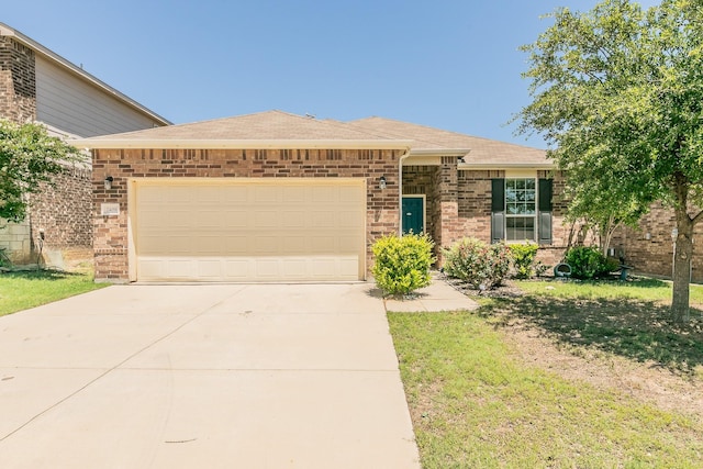 2409 Buelingo Ln, Fort Worth, TX 76131 - view of front of house with an attached garage, driveway, brick siding, roof with shingles, and a front lawn
