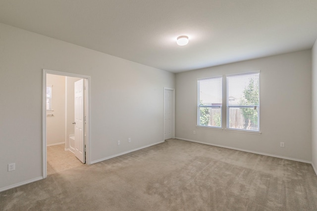 2409 Buelingo Ln, Fort Worth, TX 76131 - spare room featuring carpet flooring and baseboards