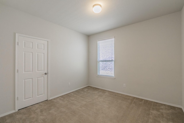 2409 Buelingo Ln, Fort Worth, TX 76131 - spare room featuring light colored carpet and baseboards