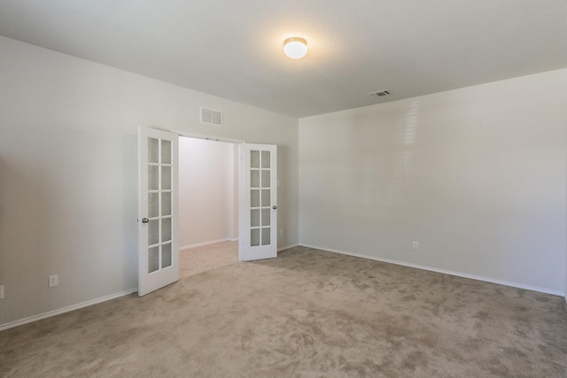 2409 Buelingo Ln, Fort Worth, TX 76131 - carpeted spare room featuring french doors and baseboards