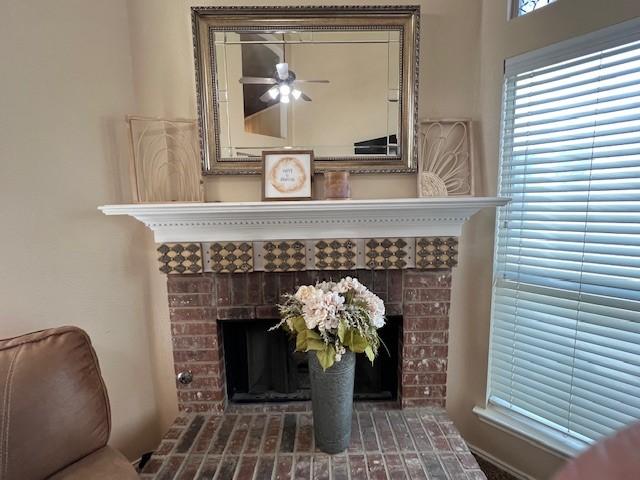 1275 Calistoga Dr, Rockwall, TX 75087 - detailed view of a fireplace and a ceiling fan