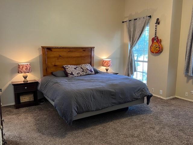 1275 Calistoga Dr, Rockwall, TX 75087 - carpeted bedroom featuring baseboards