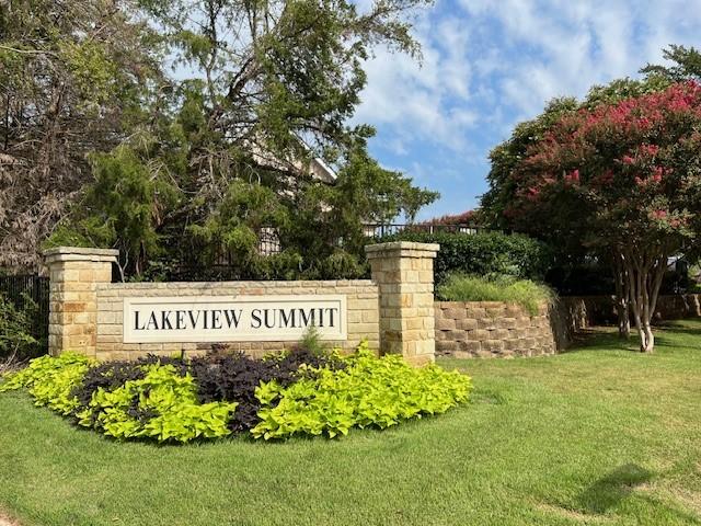 1275 Calistoga Dr, Rockwall, TX 75087 - community sign featuring a lawn