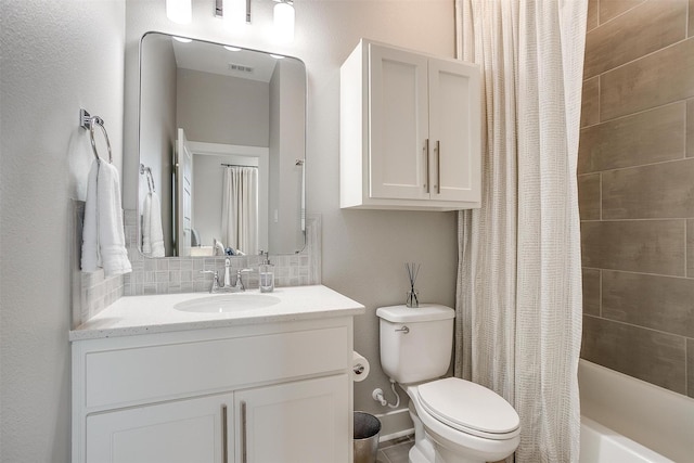 2818 Addison Park Ln, Fort Worth, TX 76110 - bathroom featuring toilet, vanity, and shower / bath combo with shower curtain