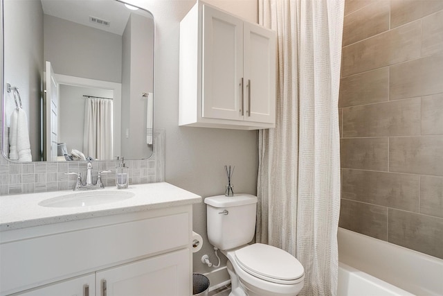 2818 Addison Park Ln, Fort Worth, TX 76110 - full bathroom with toilet, vanity, shower / tub combo, and decorative backsplash