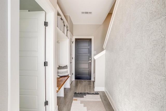 2818 Addison Park Ln, Fort Worth, TX 76110 - mudroom with wood finished floors and baseboards