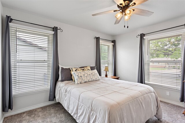 3532 Haltom Rd, Haltom City, TX 76117 - bedroom with carpet flooring, baseboards, and ceiling fan