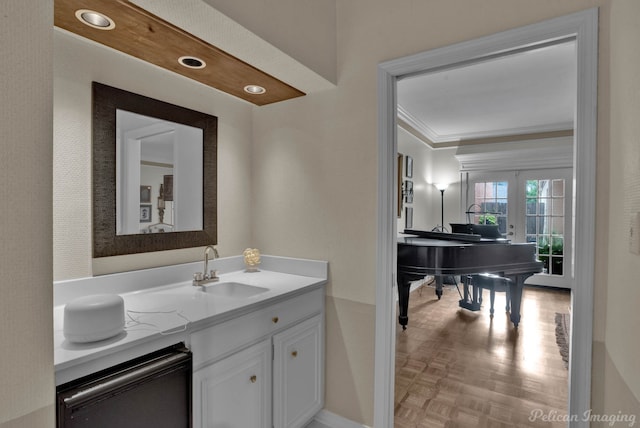 23 Tealwood, Shreveport, LA 71104 - bathroom featuring ornamental molding, vanity, baseboards, recessed lighting, and french doors