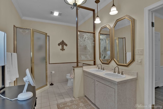 23 Tealwood, Shreveport, LA 71104 - full bathroom featuring toilet, tile patterned floors, tile walls, crown molding, and double vanity