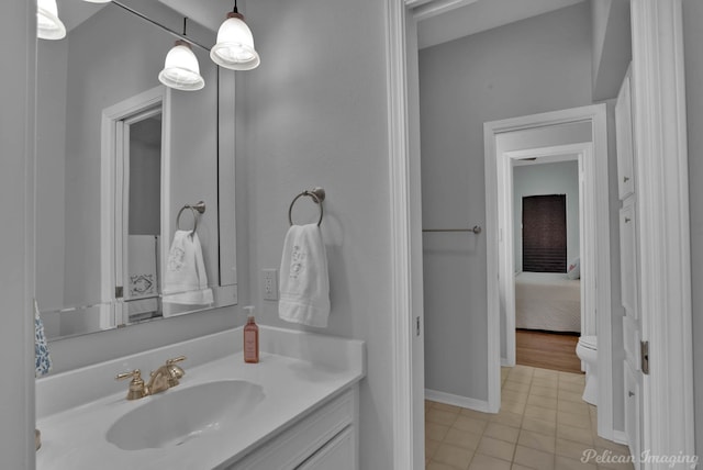 23 Tealwood, Shreveport, LA 71104 - bathroom with vanity, tile patterned flooring, toilet, and baseboards