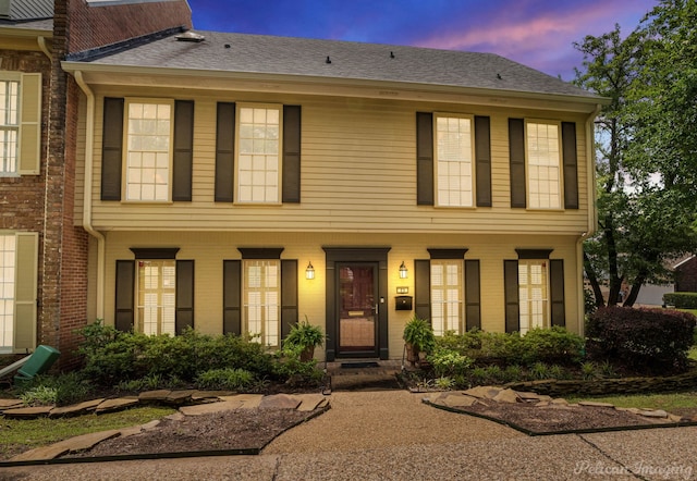 23 Tealwood, Shreveport, LA 71104 - view of front of property with a shingled roof and brick siding