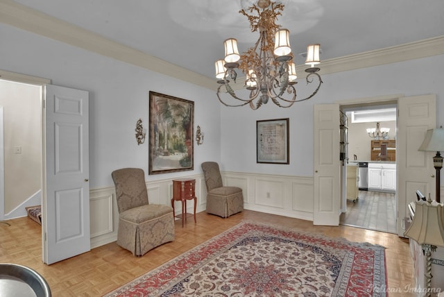 23 Tealwood, Shreveport, LA 71104 - living area with a chandelier, wainscoting, ornamental molding, and a decorative wall