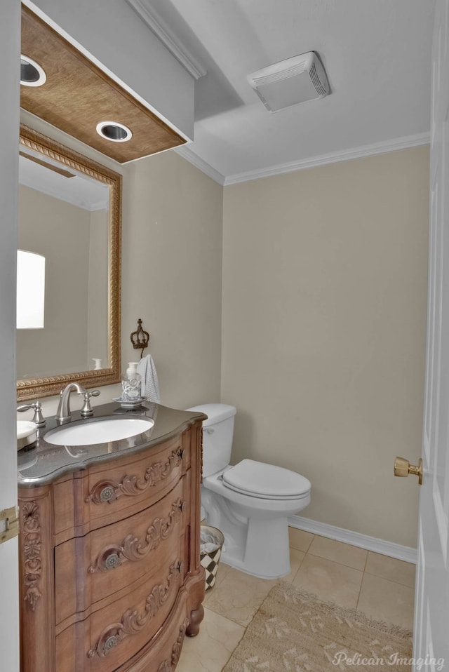 23 Tealwood, Shreveport, LA 71104 - half bathroom featuring ornamental molding, toilet, vanity, and tile patterned floors