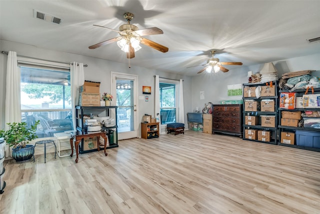 339 W Trinity St, Forney, TX 75126 - living area featuring a ceiling fan and wood finished floors