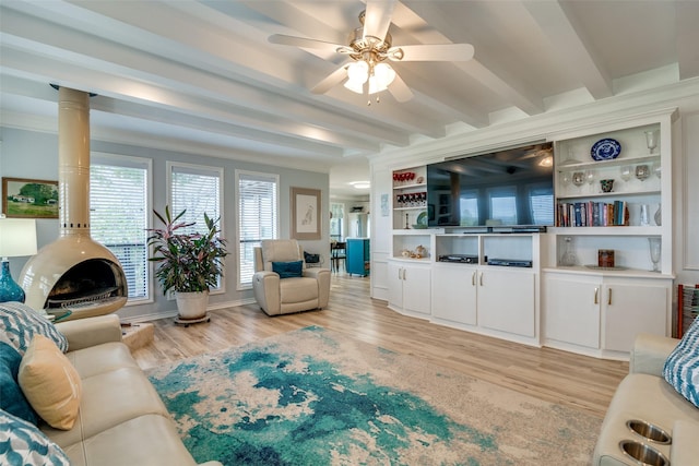 339 W Trinity St, Forney, TX 75126 - living area with beam ceiling, light wood finished floors, and a ceiling fan