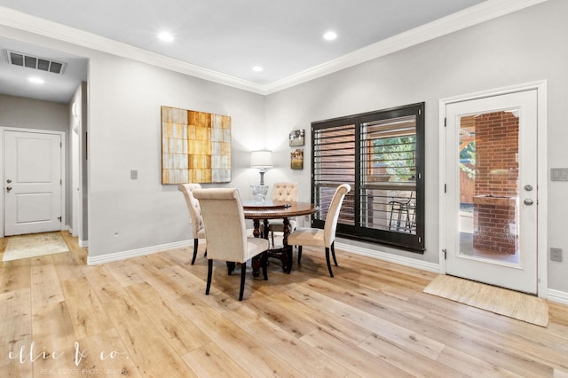 2409 Lynbrook Dr, Abilene, TX 79606 - dining space with ornamental molding, baseboards, wood finished floors, and recessed lighting