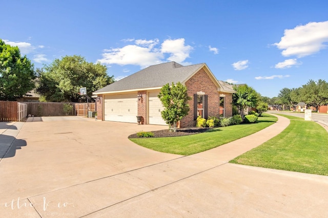 2409 Lynbrook Dr, Abilene, TX 79606 - view of side of home with brick siding, concrete driveway, and a garage