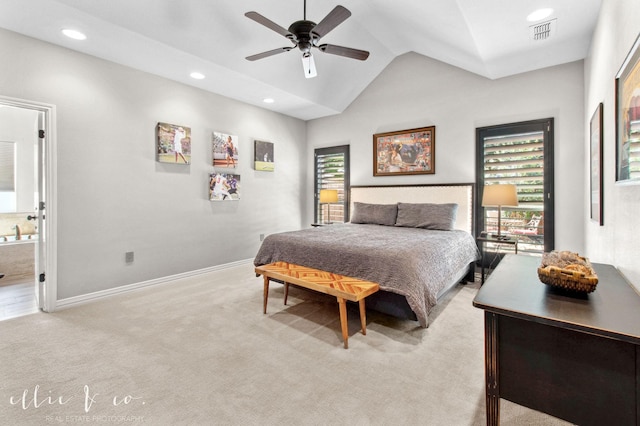 2409 Lynbrook Dr, Abilene, TX 79606 - bedroom featuring light colored carpet, recessed lighting, lofted ceiling, baseboards, and ensuite bathroom