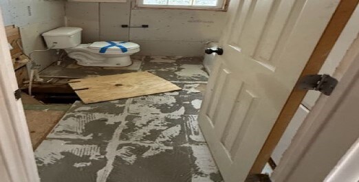417 E 10th St, Coleman, TX 76834 - bathroom featuring toilet