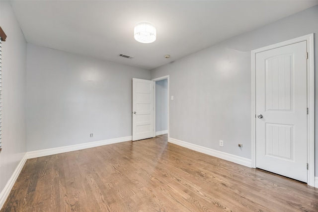 317 Edgefield Dr, Garland, TX 75040 - unfurnished room featuring baseboards and light wood-style floors