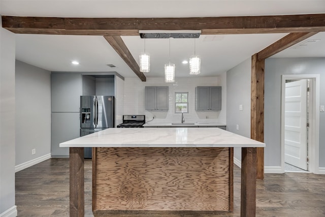 317 Edgefield Dr, Garland, TX 75040 - kitchen with gray cabinets, a sink, stainless steel appliances, dark wood-type flooring, and beam ceiling
