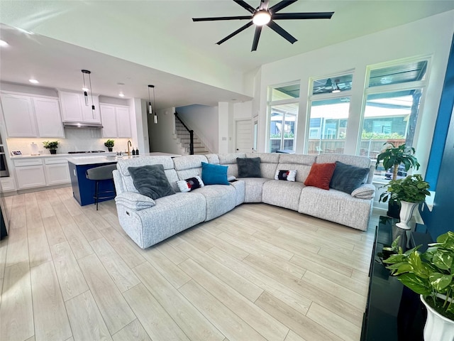 13333 Hedgebrook Pl, Fort Worth, TX 76008 - living room with a ceiling fan, light wood finished floors, stairs, and recessed lighting