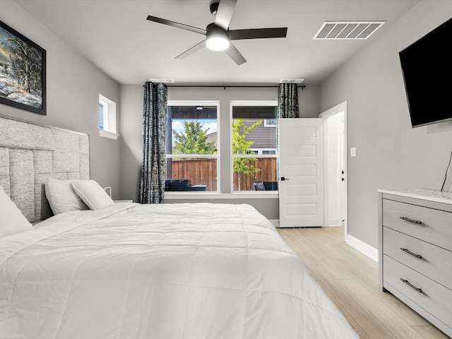 13333 Hedgebrook Pl, Fort Worth, TX 76008 - bedroom with light wood-type flooring, baseboards, and a ceiling fan