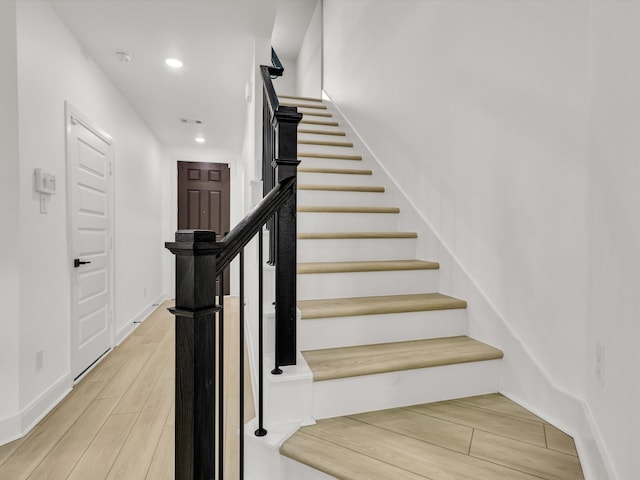 13333 Hedgebrook Pl, Fort Worth, TX 76008 - stairs with recessed lighting, wood finished floors, and baseboards