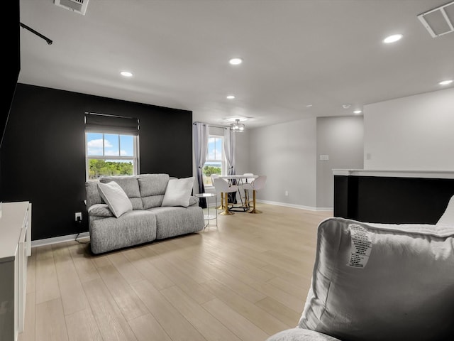 13333 Hedgebrook Pl, Fort Worth, TX 76008 - living area with light wood-style flooring, recessed lighting, and baseboards