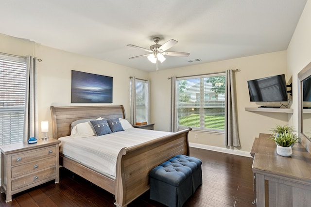 269 Love Bird Ln, Murphy, TX 75094 - bedroom featuring dark wood-style floors, baseboards, and a ceiling fan