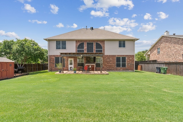 269 Love Bird Ln, Murphy, TX 75094 - back of property with brick siding, ceiling fan, and a patio area