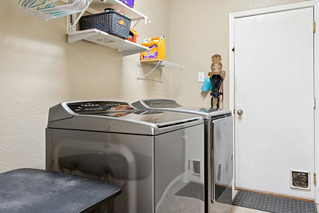 269 Love Bird Ln, Murphy, TX 75094 - laundry area featuring separate washer and dryer and tile patterned floors