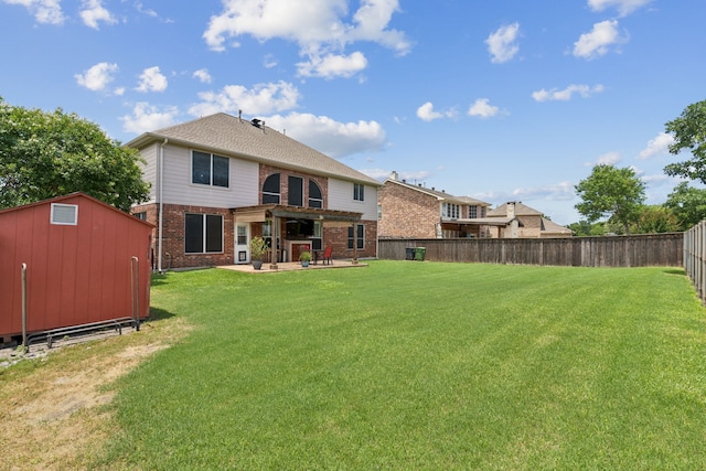 269 Love Bird Ln, Murphy, TX 75094 - rear view of property featuring brick siding and a patio area