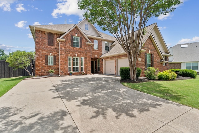 269 Love Bird Ln, Murphy, TX 75094 - traditional-style home featuring a garage, brick siding, and concrete driveway