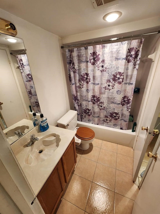 3624 Parkridge Dr Unit 213, Dallas, TX 75234 - bathroom featuring tile patterned flooring, shower / tub combo with curtain, toilet, and vanity