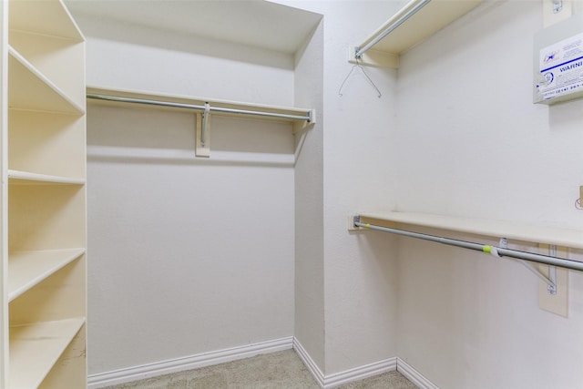 126 Oakbend Dr, Coppell, TX 75019 - walk in closet featuring carpet floors